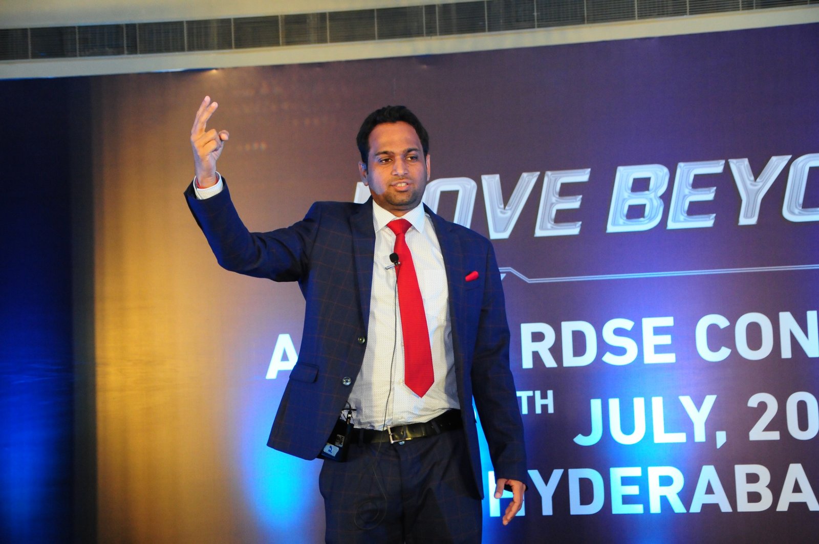 Saurabh Chharia speaking at a conference in Hyderabad
